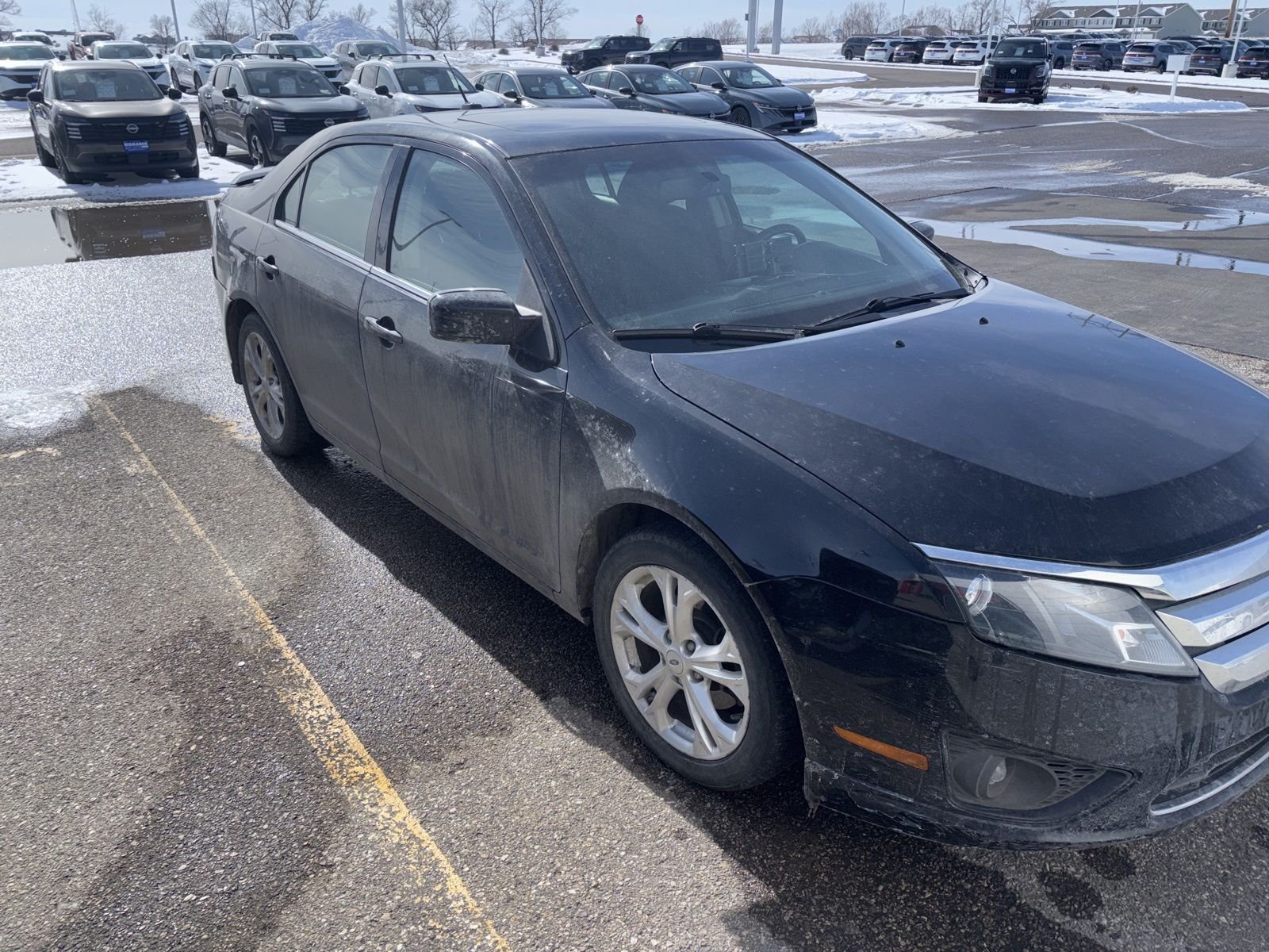 Used 2012 Ford Fusion SE with VIN 3FAHP0HA6CR124909 for sale in Mandan, ND