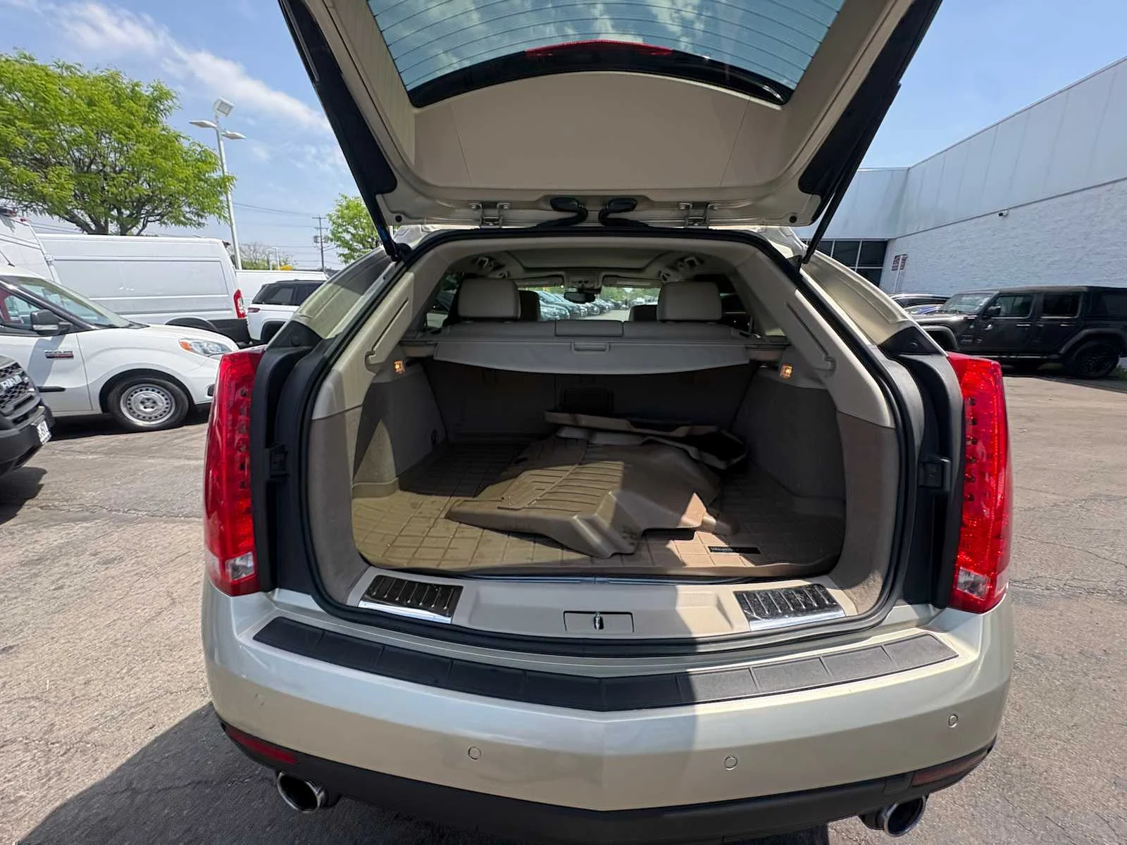 Used 2015 Silver Coast Metallic Cadillac Luxury Collection image 21