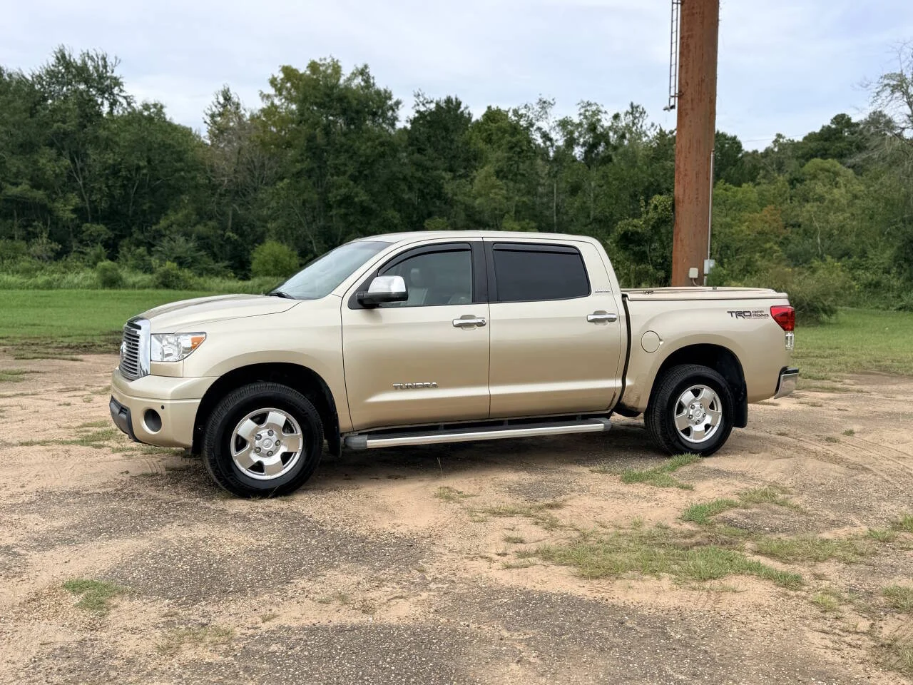 Used 2010 Tan Toyota Limited 4x2 4dr CrewMax Cab Pickup SB (5.7L V8) image 1