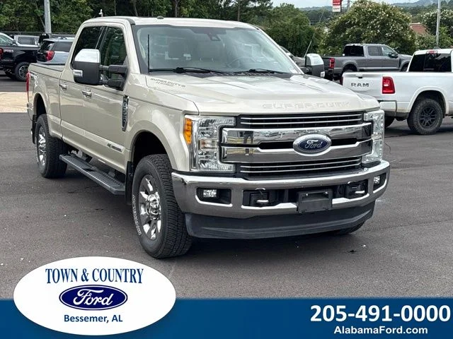 Used 2017 Gold Ford Lariat image 1