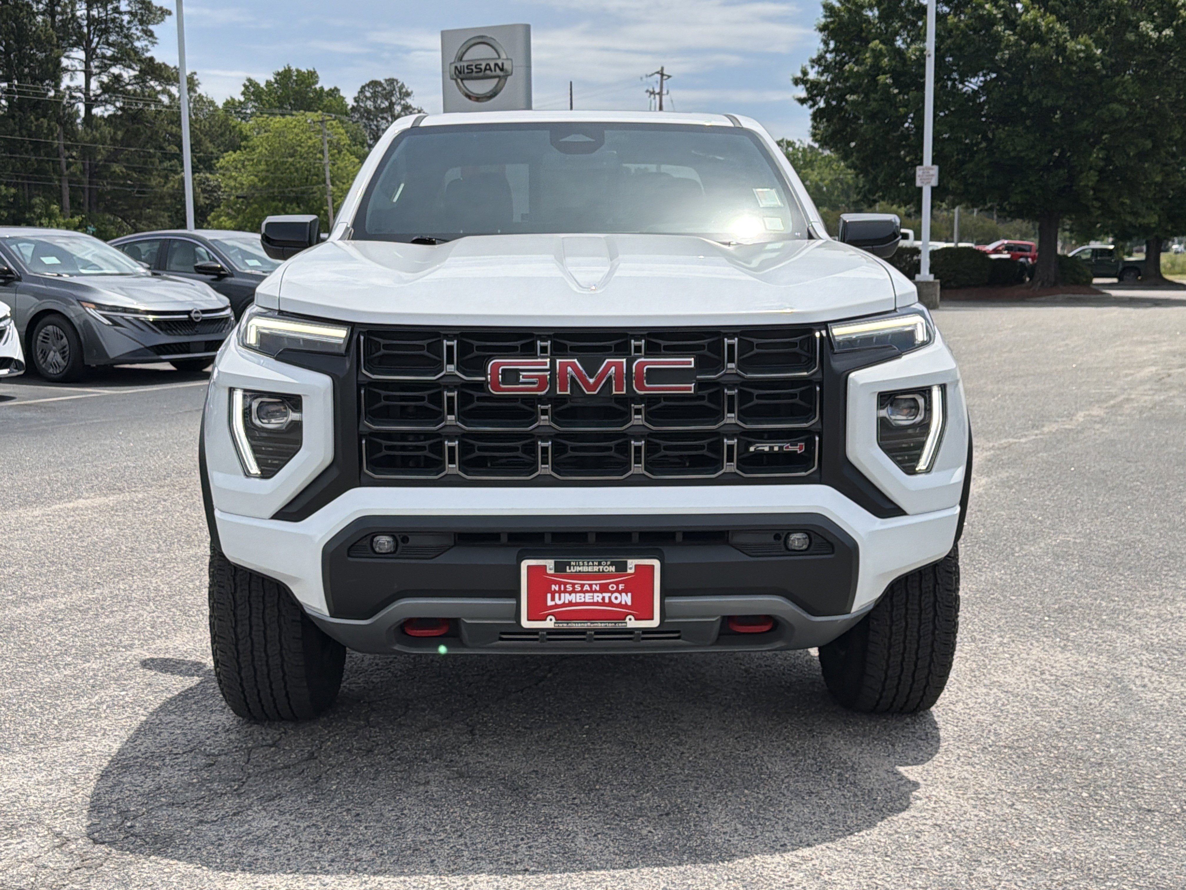 Used 2023 Summit White GMC 4WD AT4 image 33