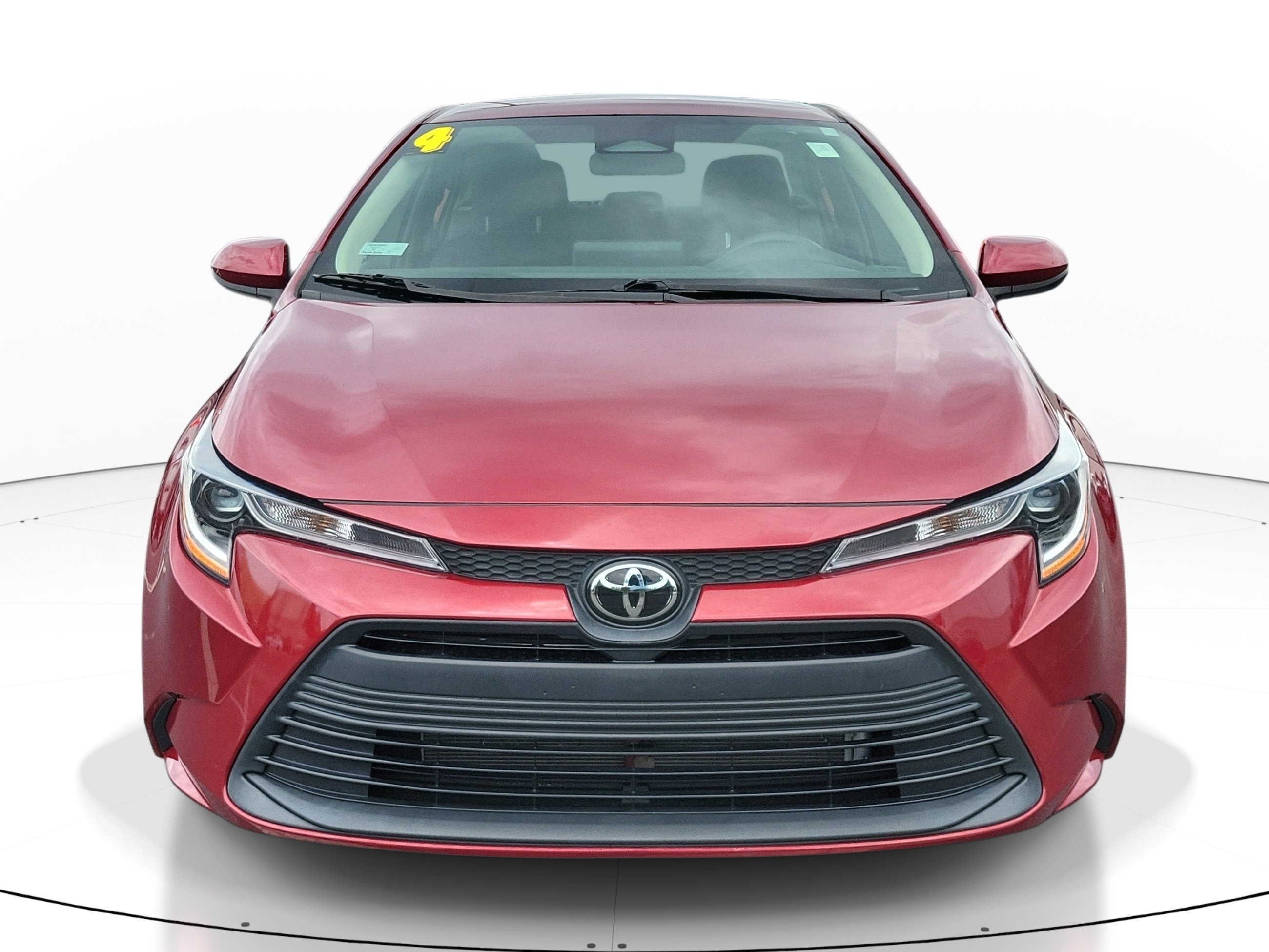 Used 2024 Ruby Flare Pearl Toyota LE image 1