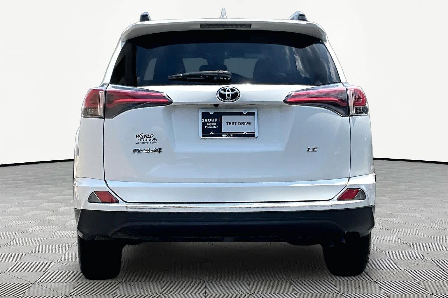 Used 2018 Super White Toyota LE image 5