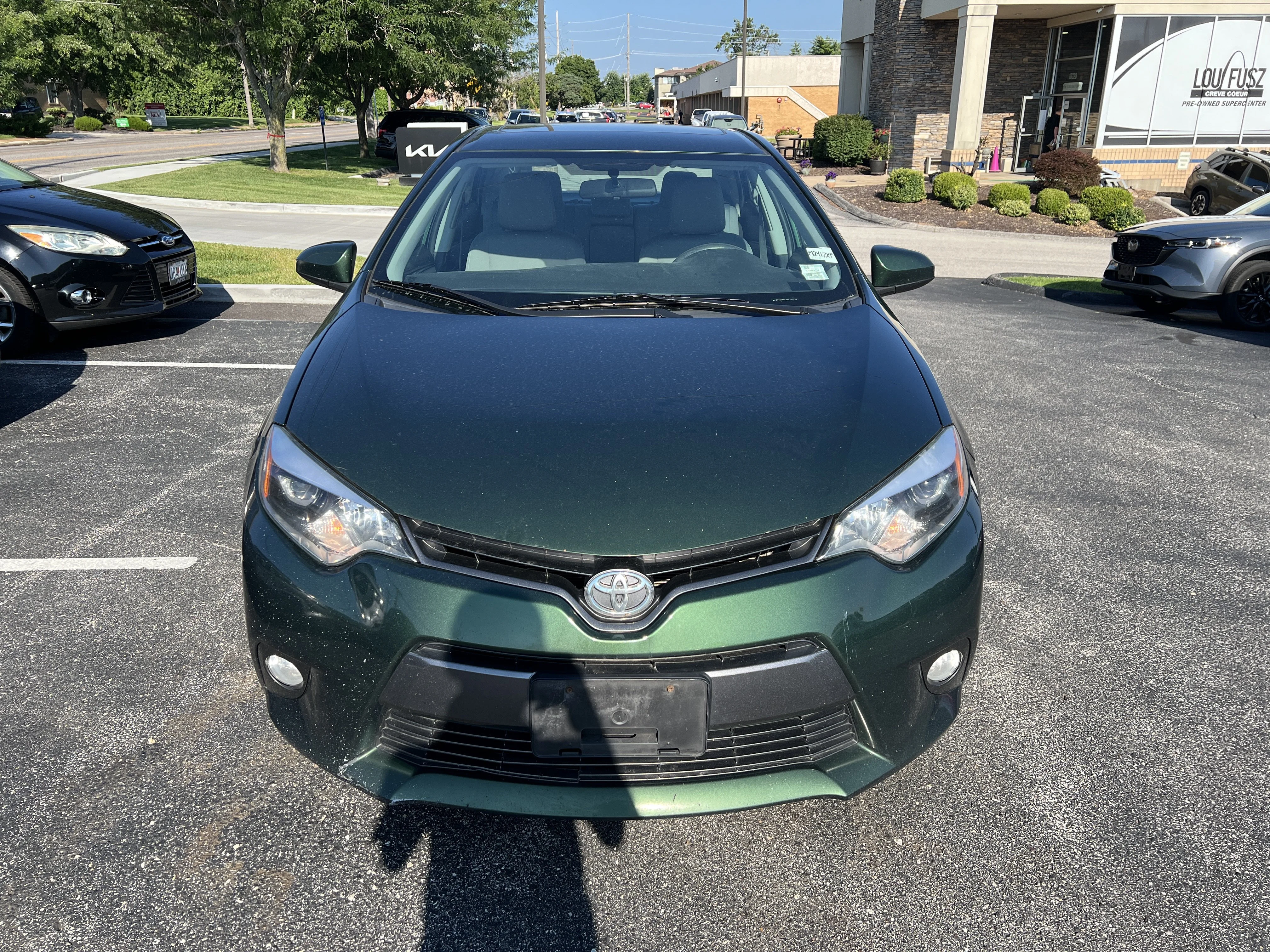 Used 2016 4evergreen Metallic Toyota LE Plus image 2
