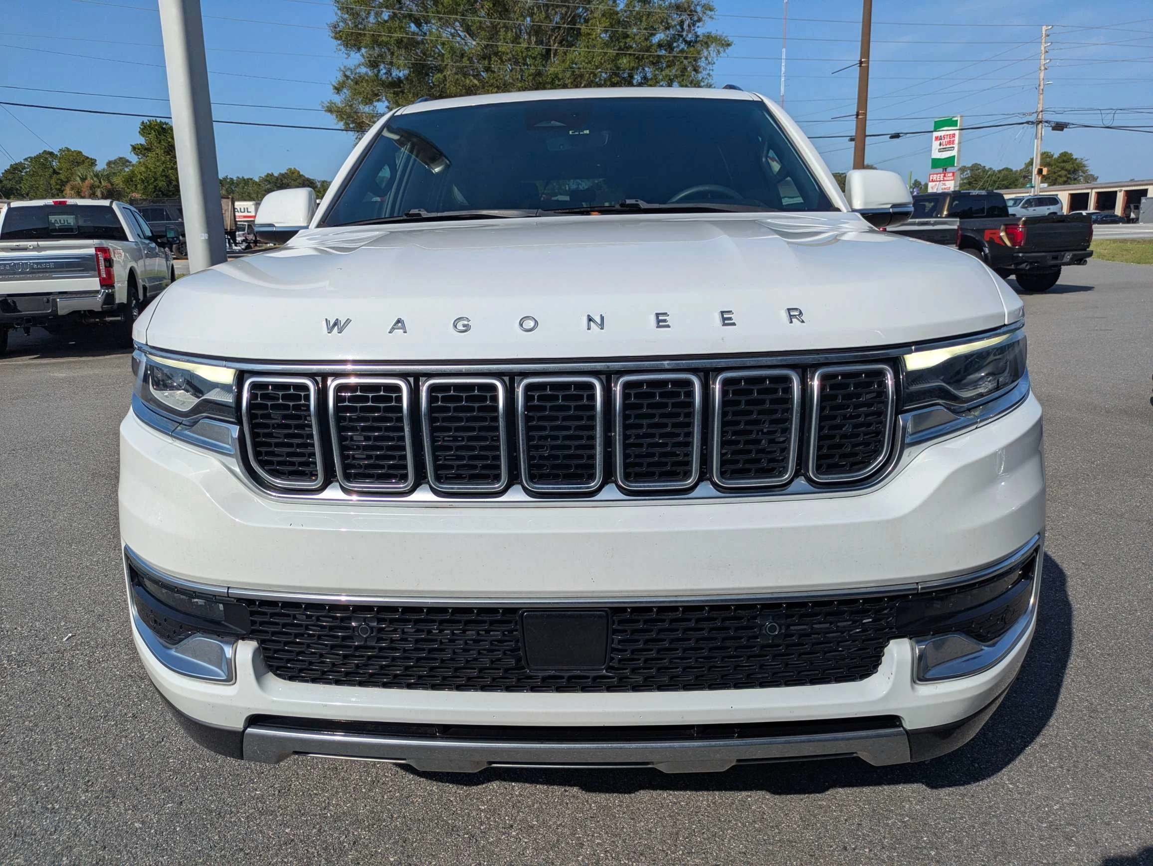 Certified Used 2022 Bright White Clearcoat Jeep Series III w/Leather Quad Buckets, Panoramic Moonroof, 10.25 Screen, & 3rd Row Seat image 9
