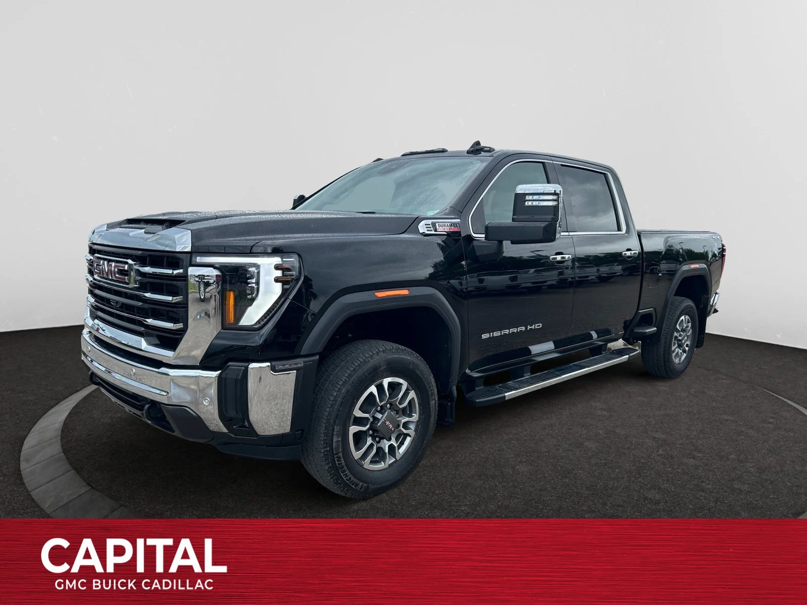 Used 2025 Onyx Black GMC SLT Crew 6.6L DIESEL Leather Sunroof 4x4 image 1