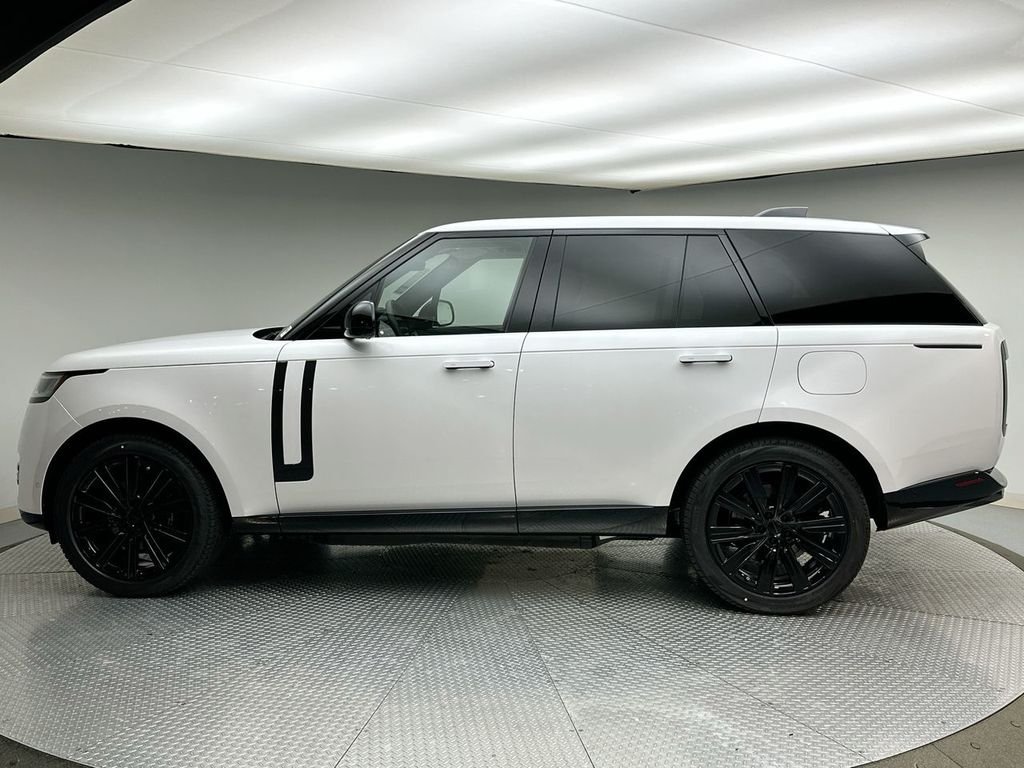 New 2026 Ostuni Pearl Wht Prem Met Land Rover SE image 2