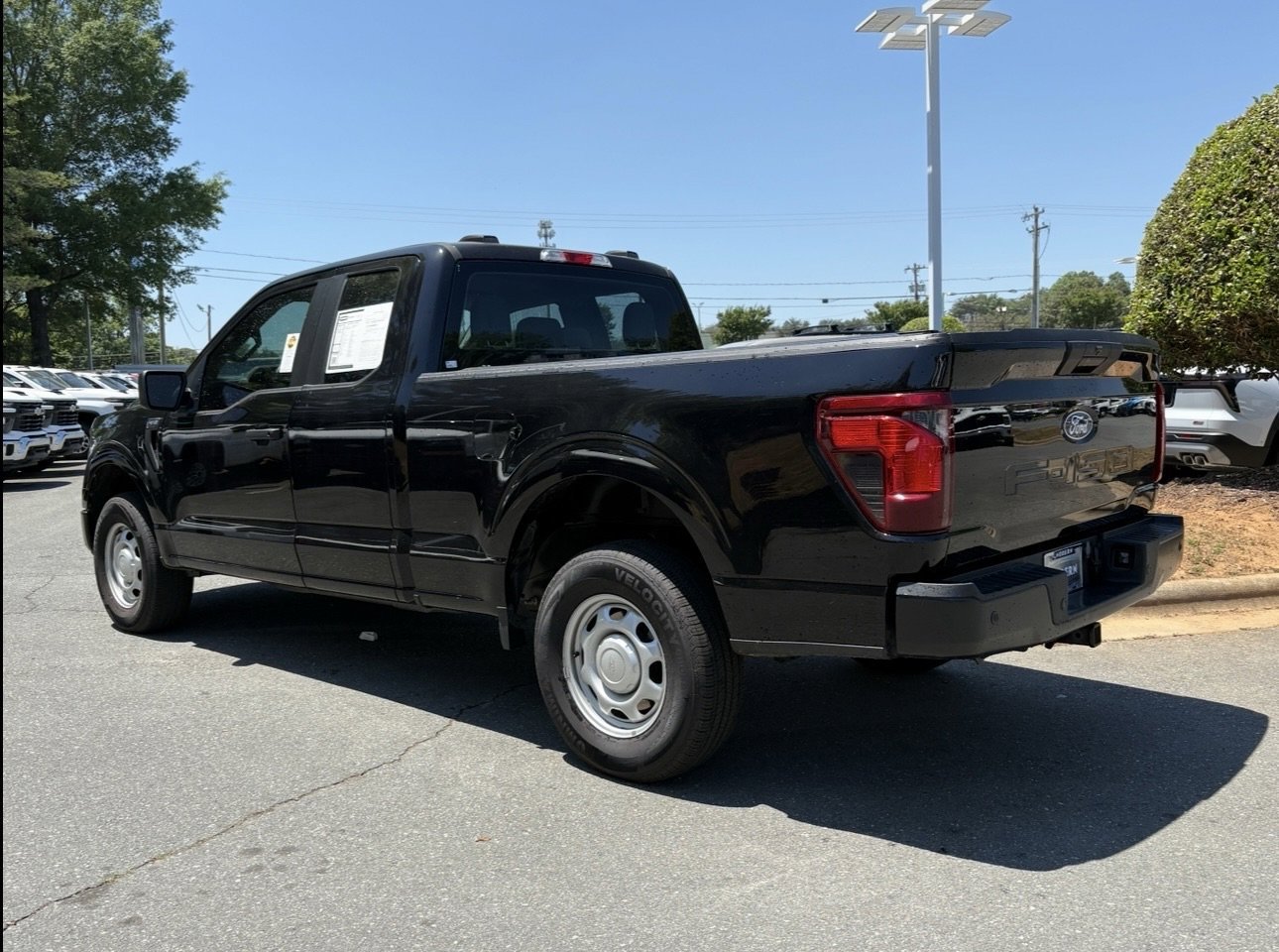 Used 2024 Agate Black Metallic Ford XL image 3
