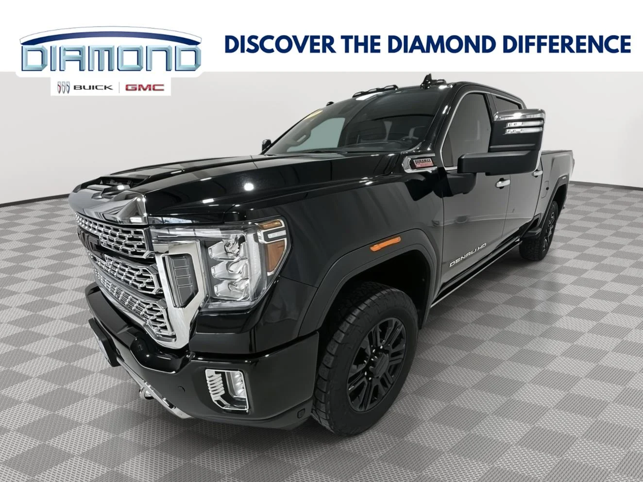 Used 2021 EBONY TWILIGHT METALLIC GMC Denali image 1