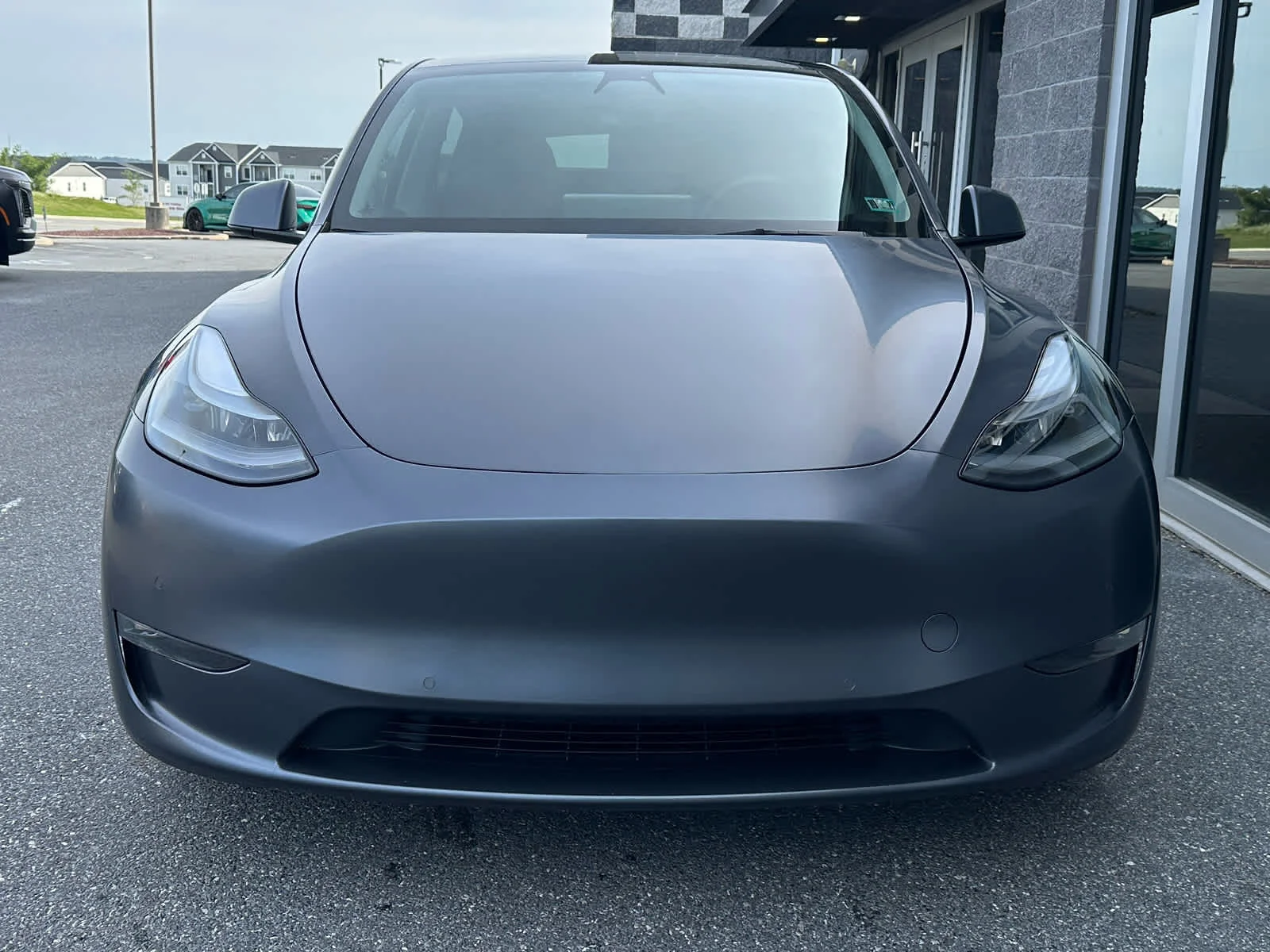 Used 2022 Solid Black Tesla Performance image 2