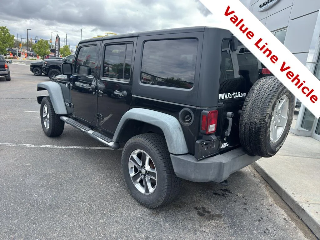 Used 2011 Black Clearcoat Jeep Sport image 3