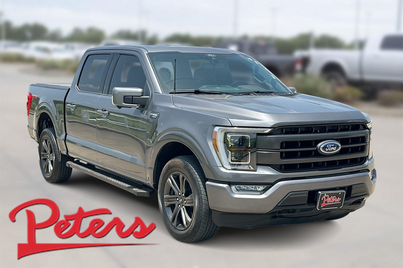 Used 2021 Gray Metallic Ford LARIAT image 1