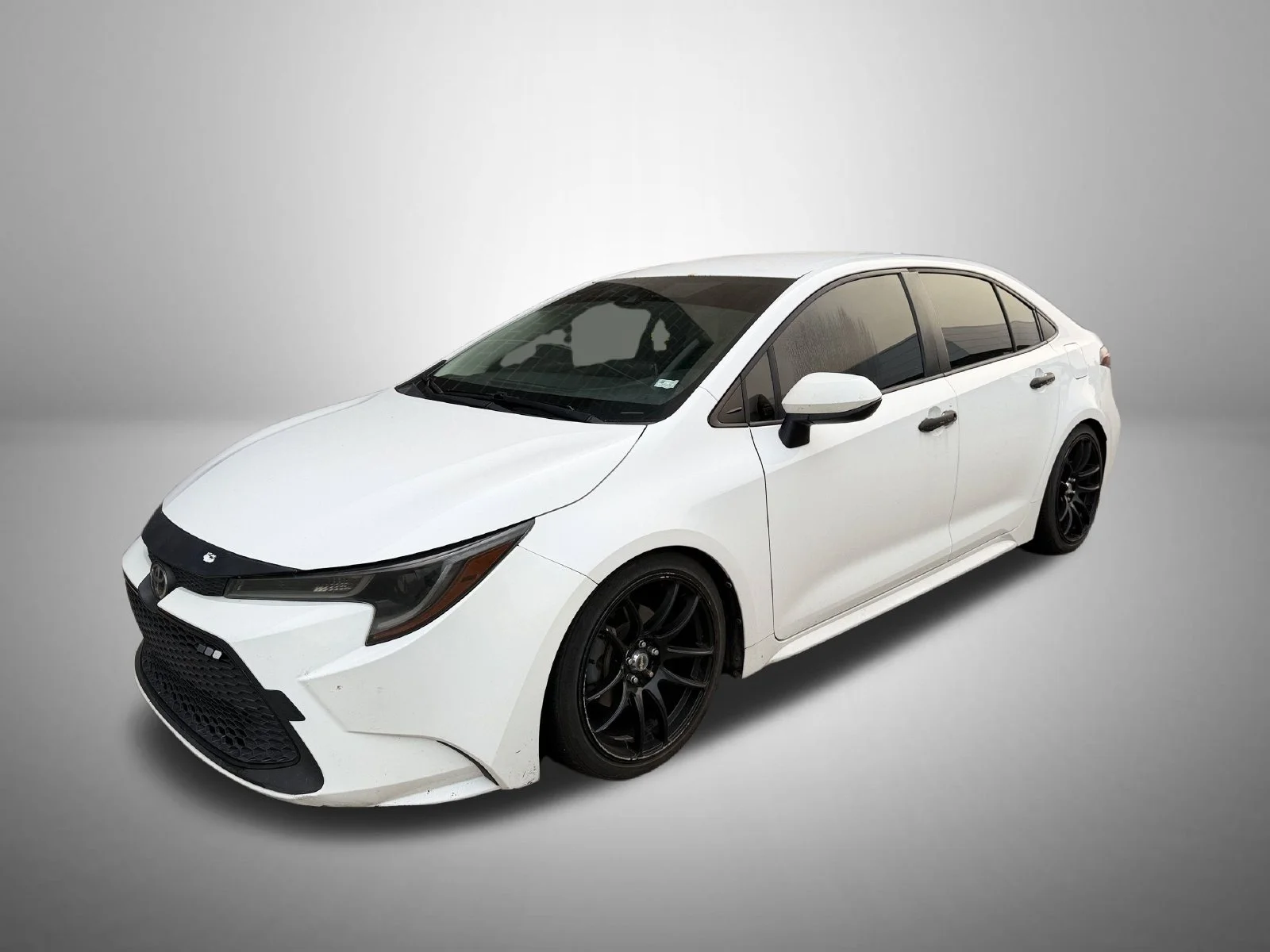 Used 2021 White Toyota LE image 1