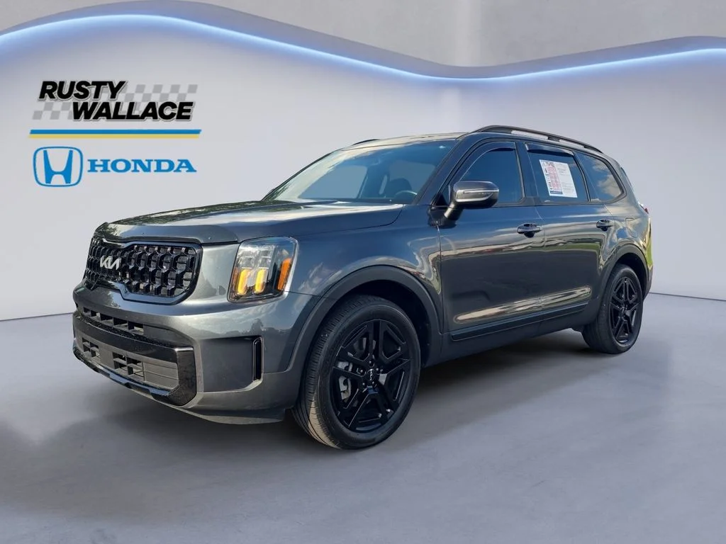 Used 2024 Gravity Gray Kia EX X-Line image 1