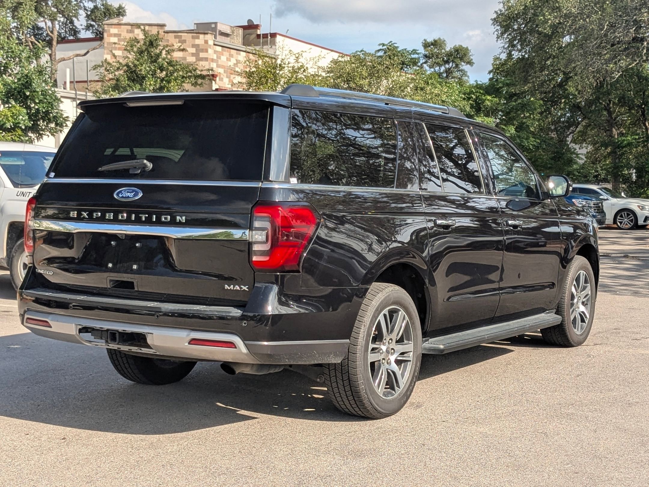 Used 2024 Black Metallic Ford Limited image 3