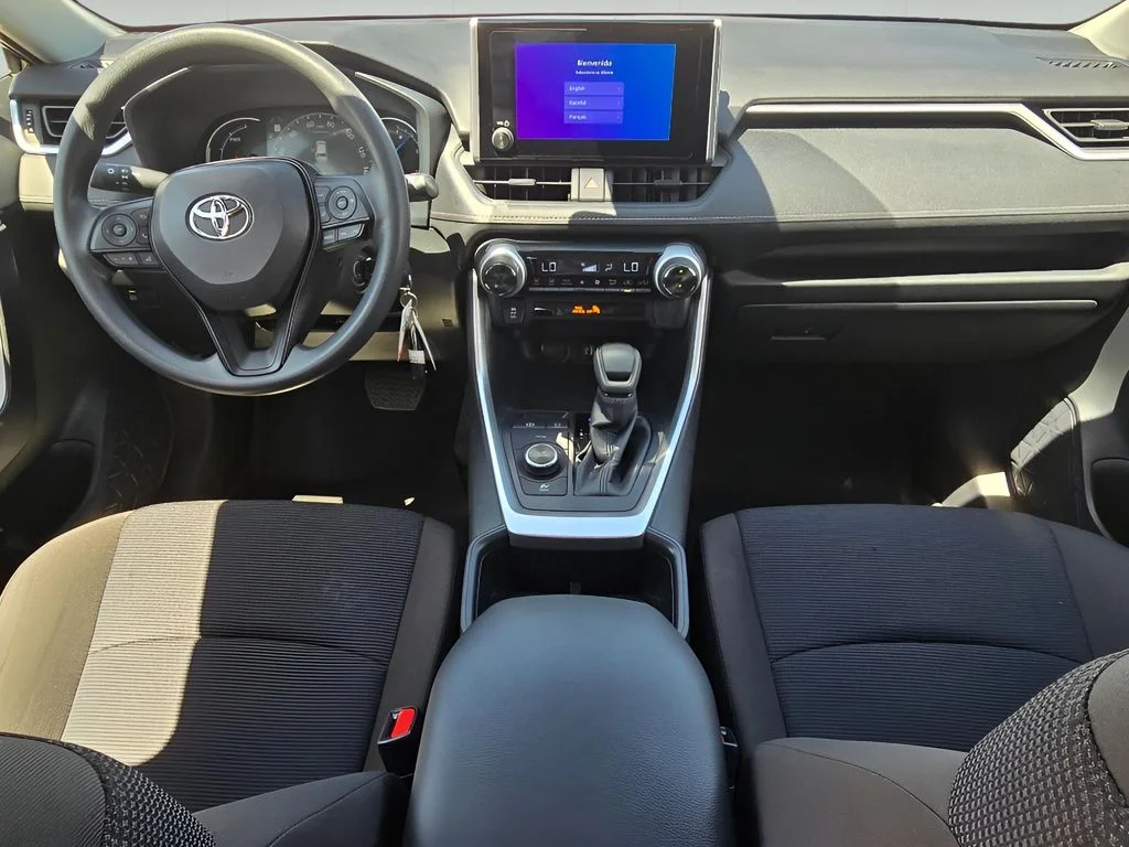 Used 2025 Midnight Black Metallic Toyota Hybrid LE image 14