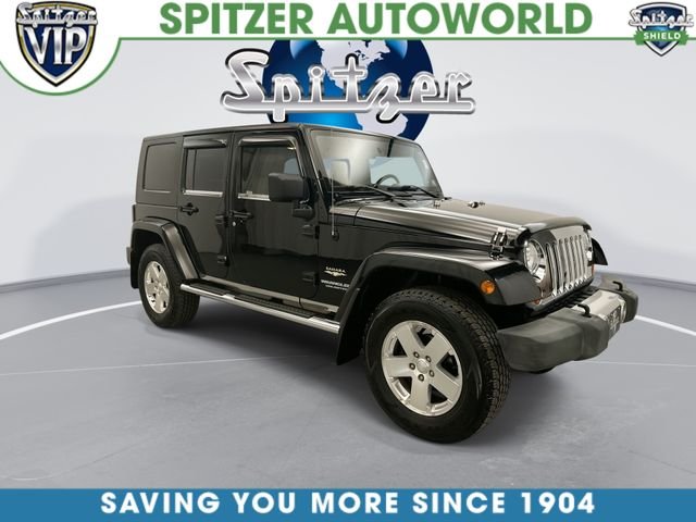 Used 2009 Black Jeep Unlimited Sahara image 2