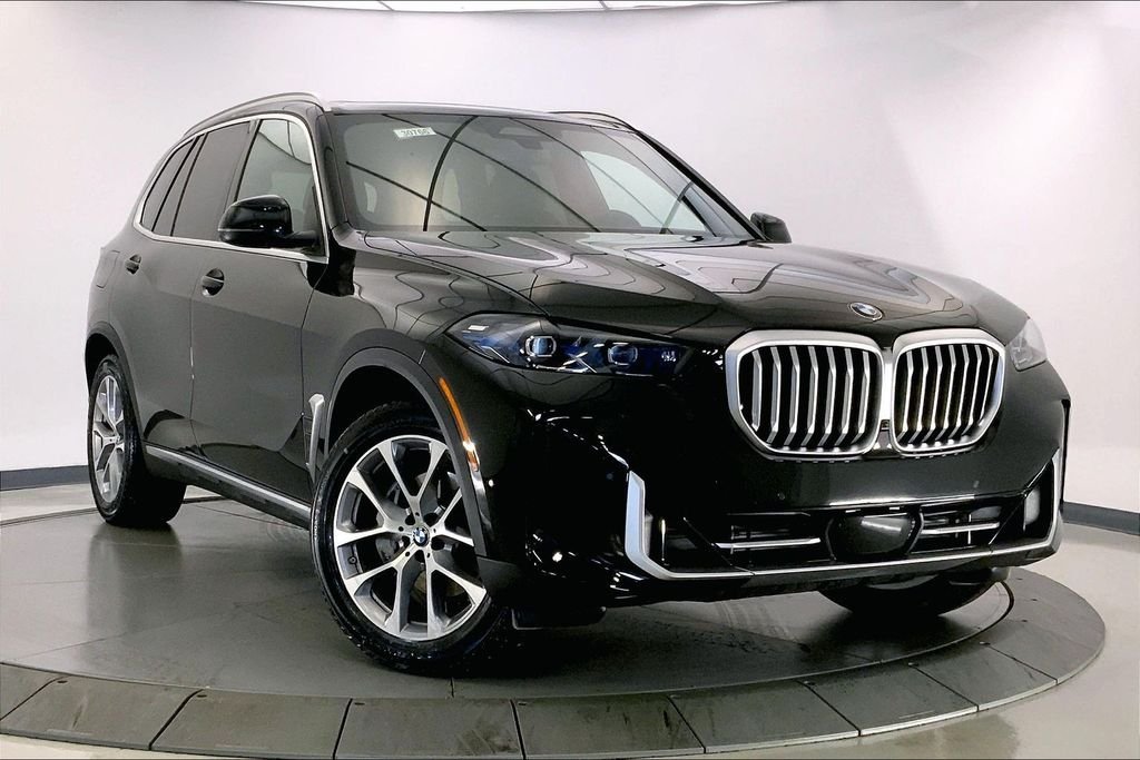Used 2026 Black Sapphire Metallic BMW  image 1