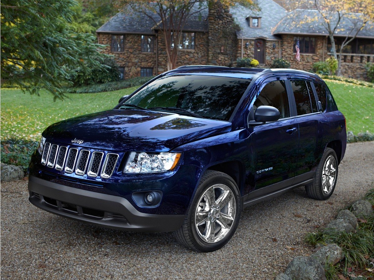 Used 2012 Mineral Gray Metallic Jeep Sport image 1
