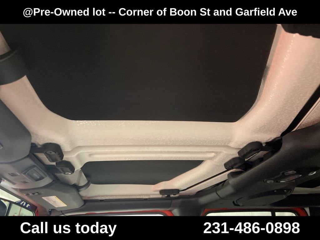 Used 2018 Orange Jeep Unlimited Sahara image 11