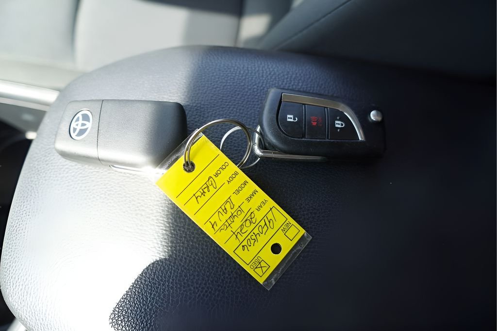 Used 2024 Magnetic Gray Metallic Toyota LE image 1