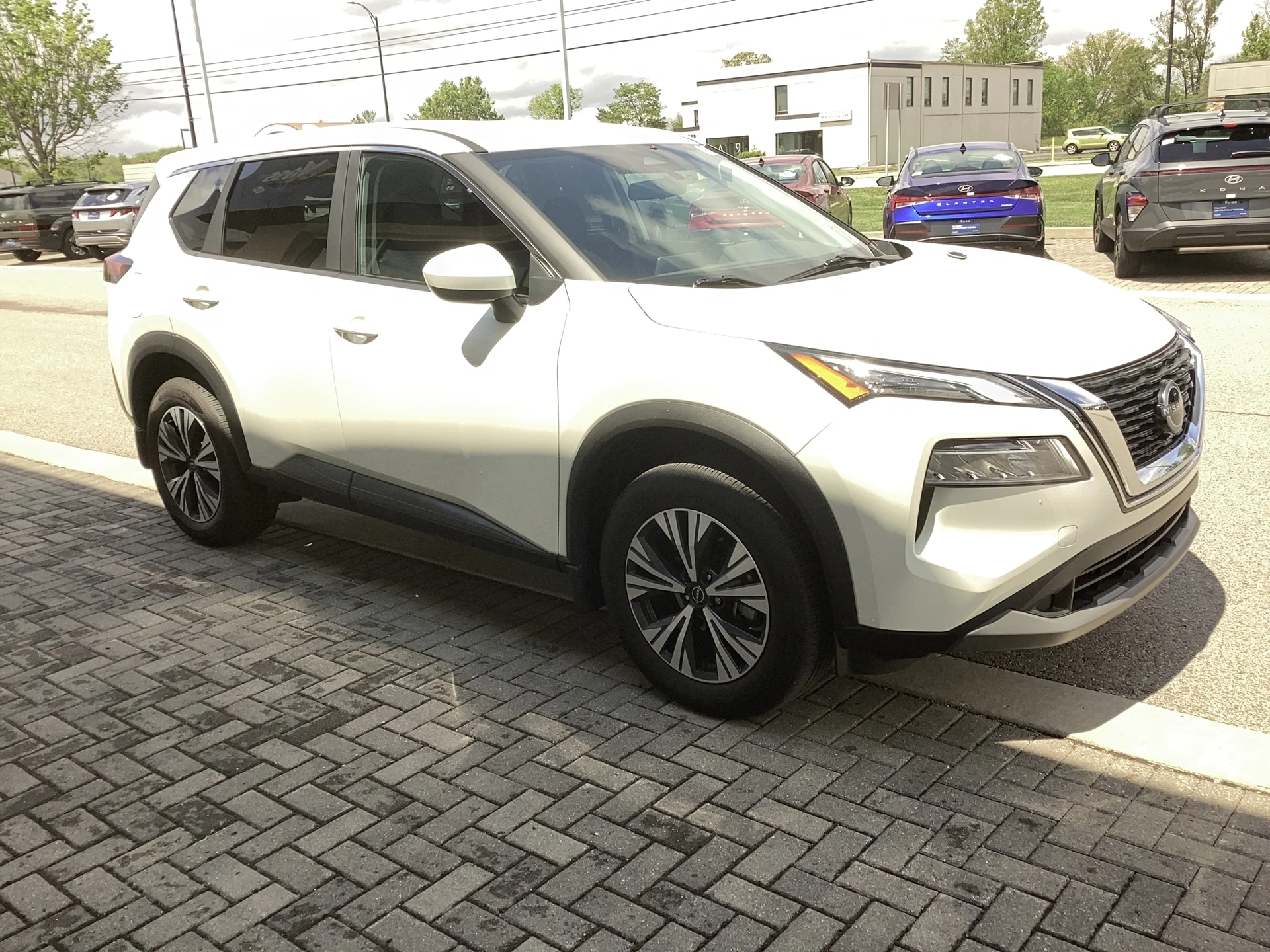 Used 2023 Pearl White TriCoat Nissan SV image 1
