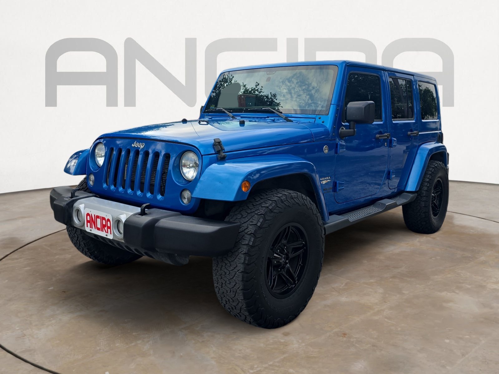Used 2015 Hydro Blue Pearl Coat Jeep Sahara image 6