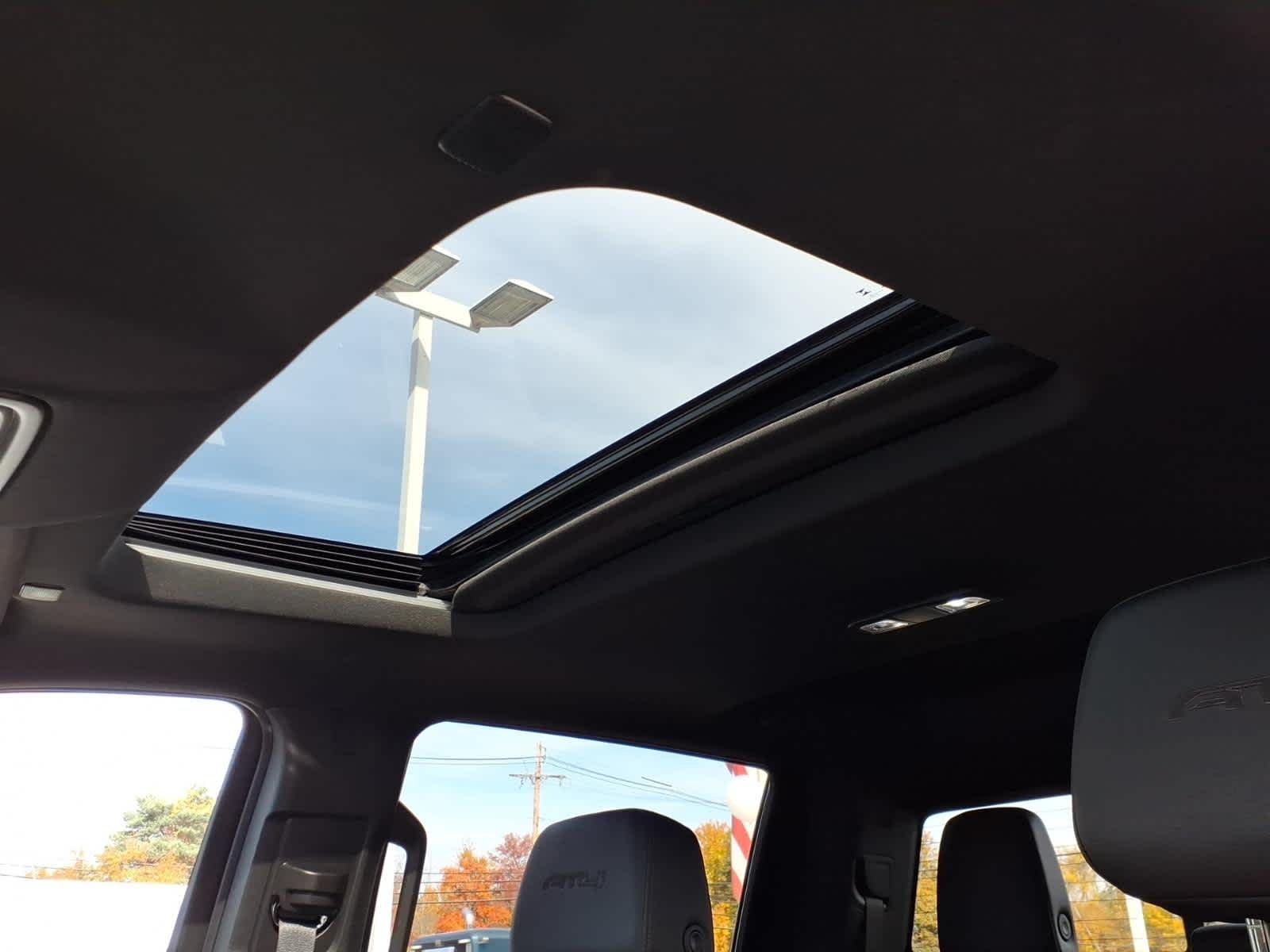 Used 2025 Thunderstorm Gray GMC AT4 image 18