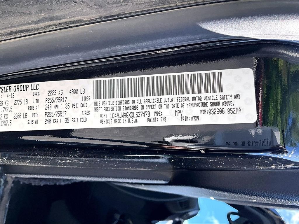 Used 2013 Black Clearcoat Jeep Sport image 6