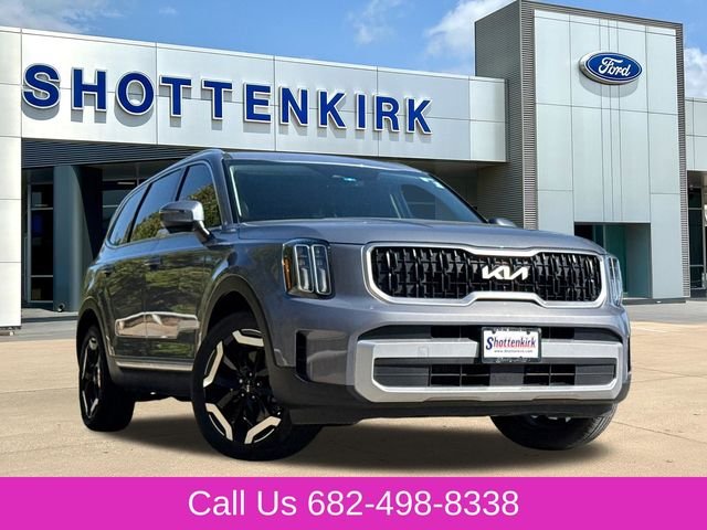 Used 2025 Silver Kia EX image 1