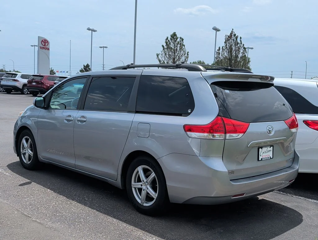 Used 2012 Toyota Sienna XLE with VIN 5TDYK3DC7CS279273 for sale in Minneapolis, Minnesota