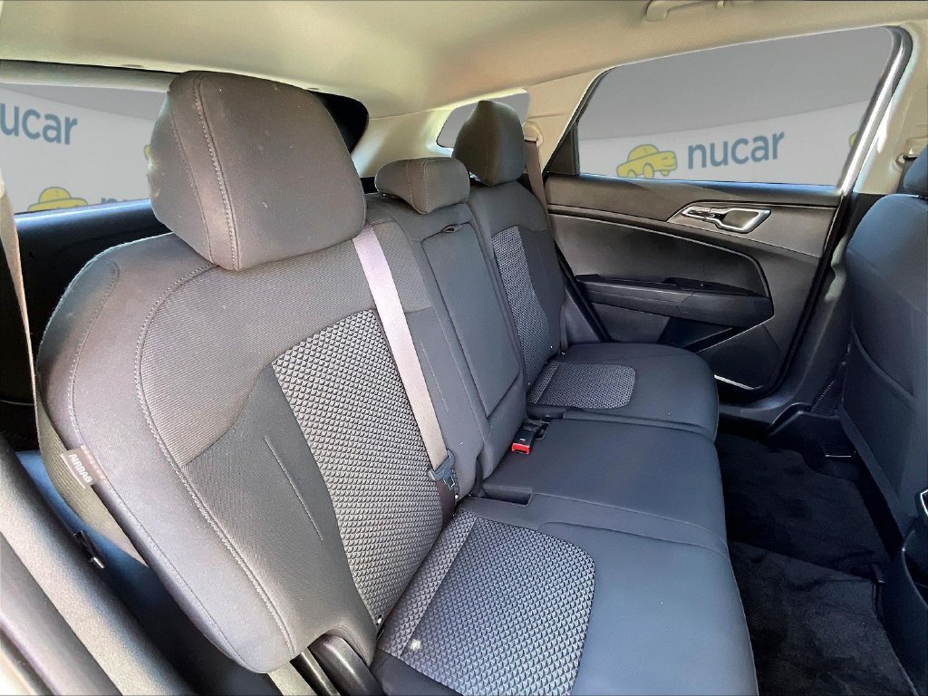 Used 2024 Snow White Pearl Kia LX image 15