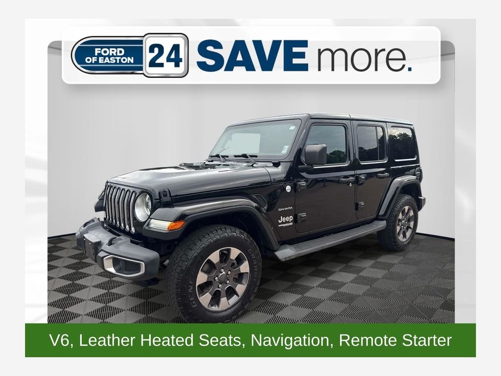 Used 2018 Black Jeep Unlimited Sahara image 1