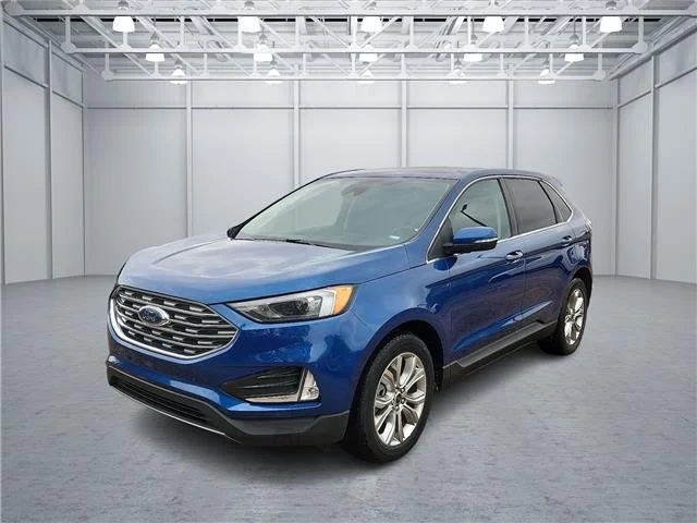Used 2024 Blue Ford Titanium All-Wheel Drive image 1
