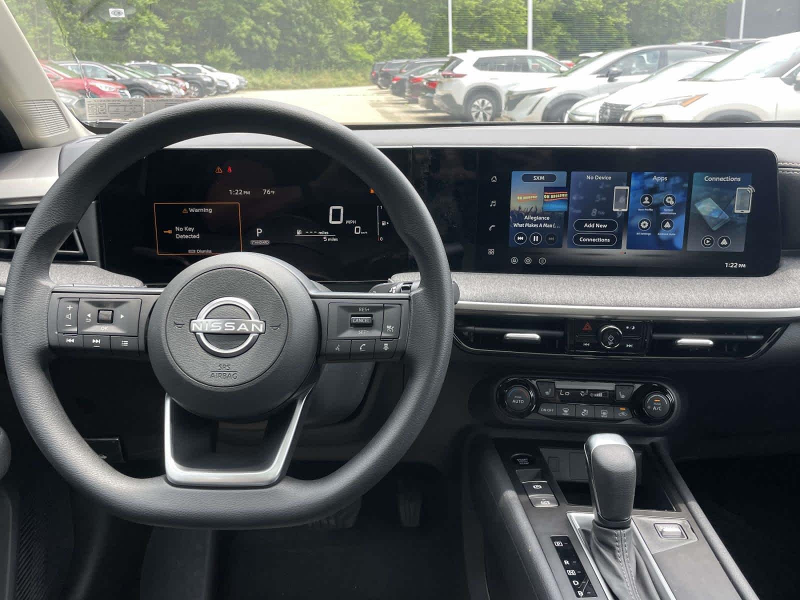 New 2026 Gun Metallic Nissan SV image 2