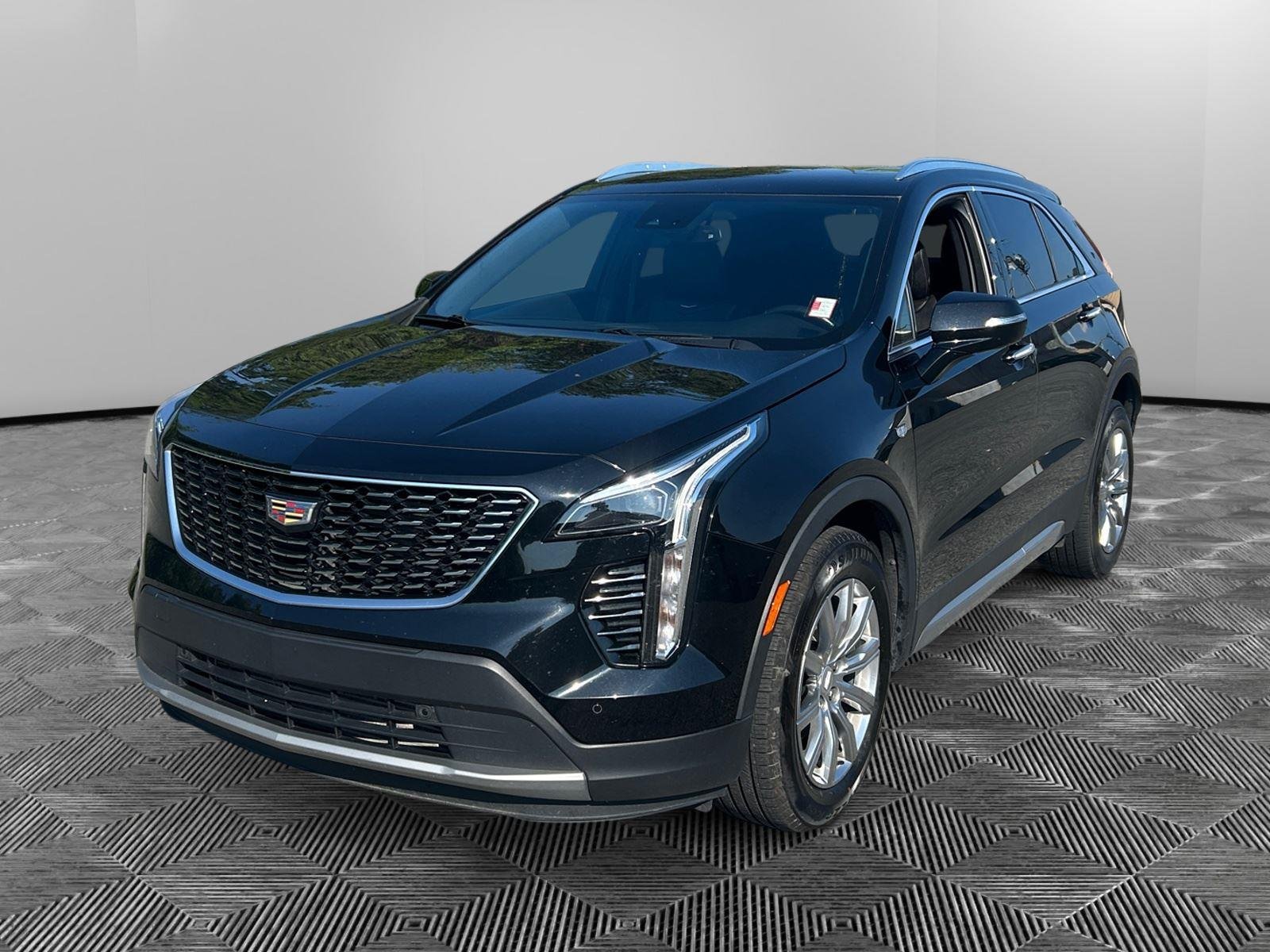 Used 2022 Stellar Black Metallic Cadillac FWD Premium Luxury image 1