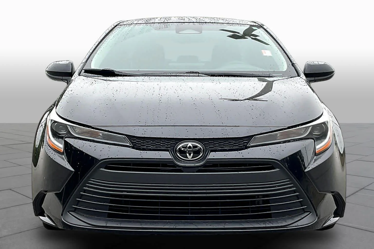 Used 2025 Midnight Black Metallic Toyota LE image 4