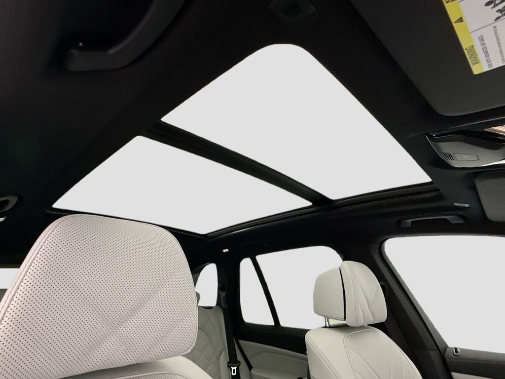 New 2026 Black Sapphire Metallic BMW xDrive50e image 17