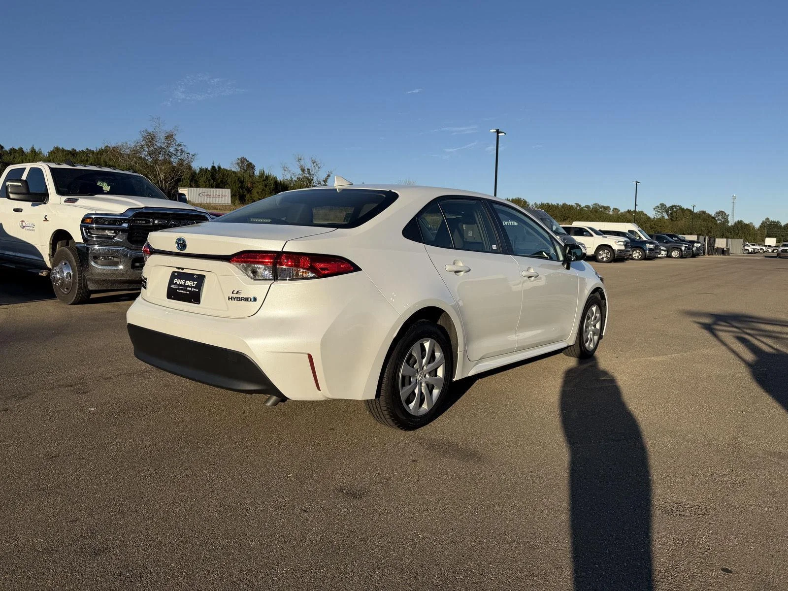 Used 2024 Wind Chill Pearl Toyota Hybrid LE image 6