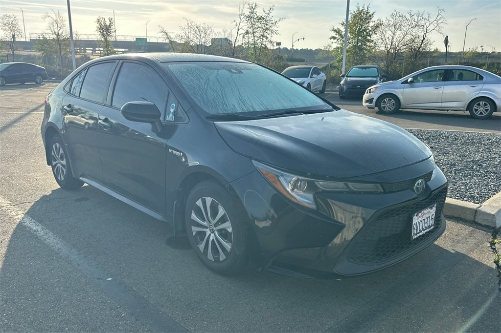 Used 2021 Toyota Corolla LE with VIN JTDEAMDE1MJ021942 for sale in Hanford, CA