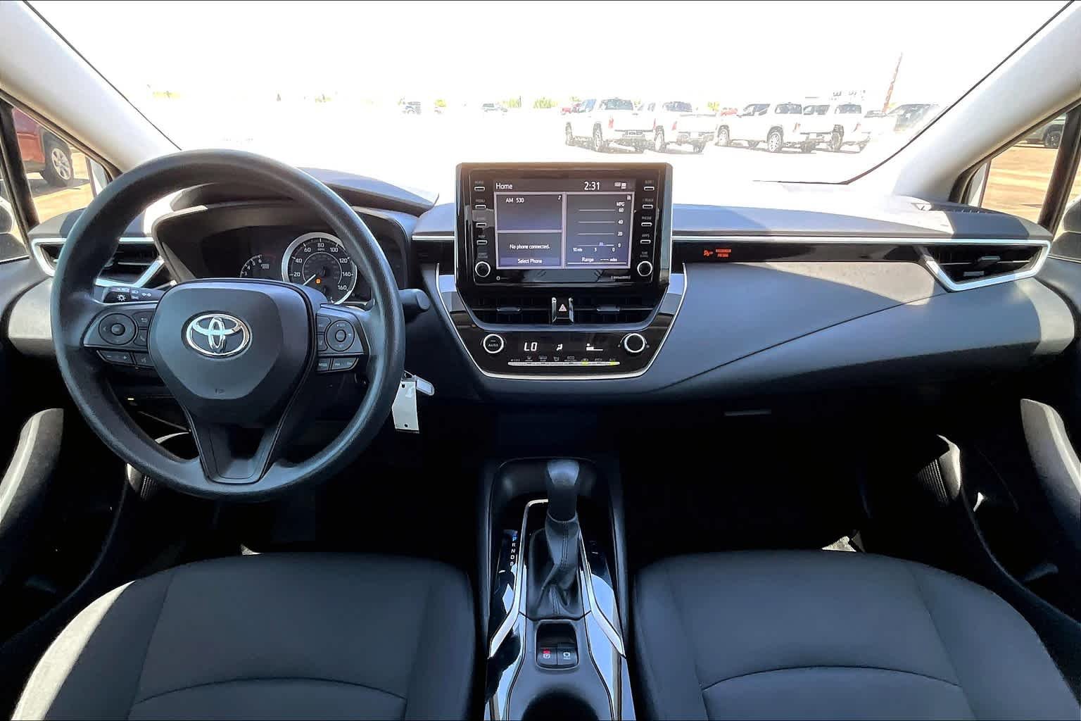Used 2021 Super White Toyota LE image 16