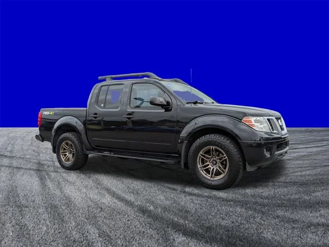 Certified Used 2018 Magnetic Black Nissan PRO-4X image 2