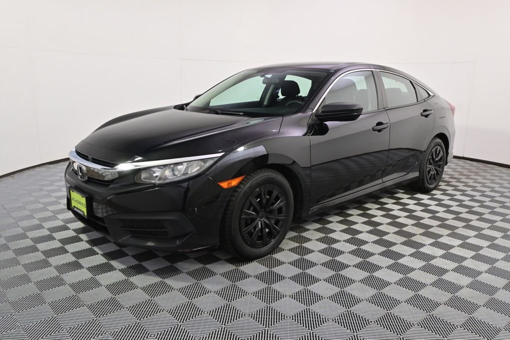 Used 2016 Honda Civic LX with VIN 19XFC2F59GE035654 for sale in St. Louis Park, MN