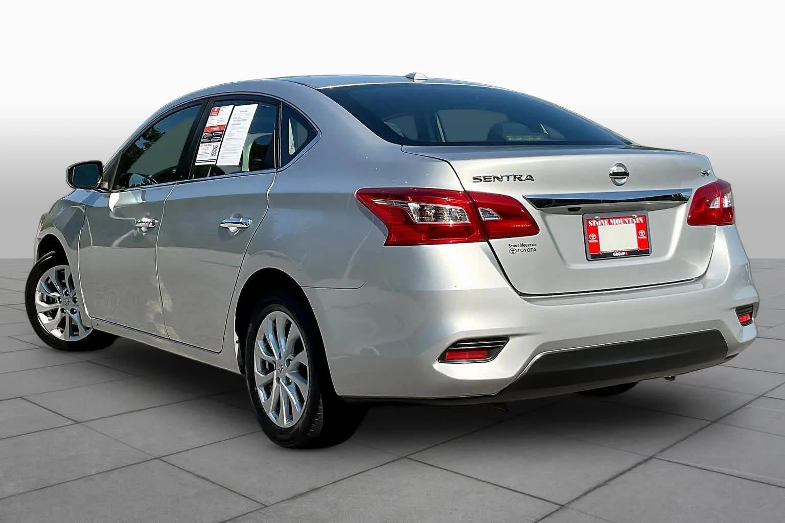 Used 2019 Brilliant Silver Metallic Nissan SV image 12