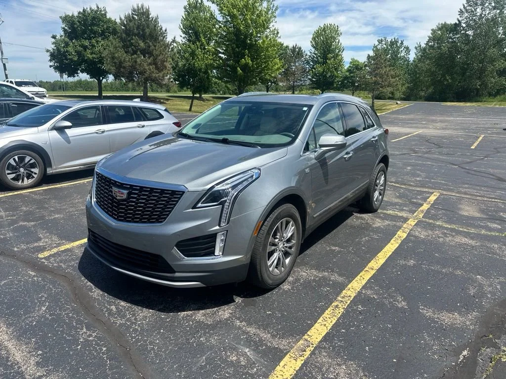Used 2023 Argent Silver Metallic Cadillac Premium Luxury image 1