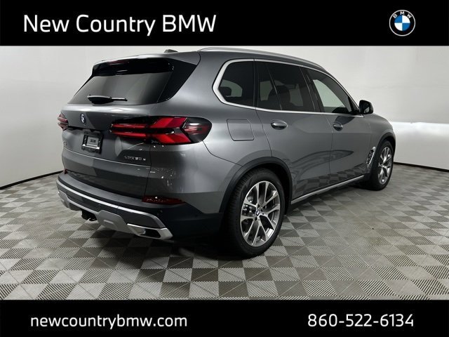 Used 2026 Skyscraper Grey Metallic BMW xDrive50e image 7