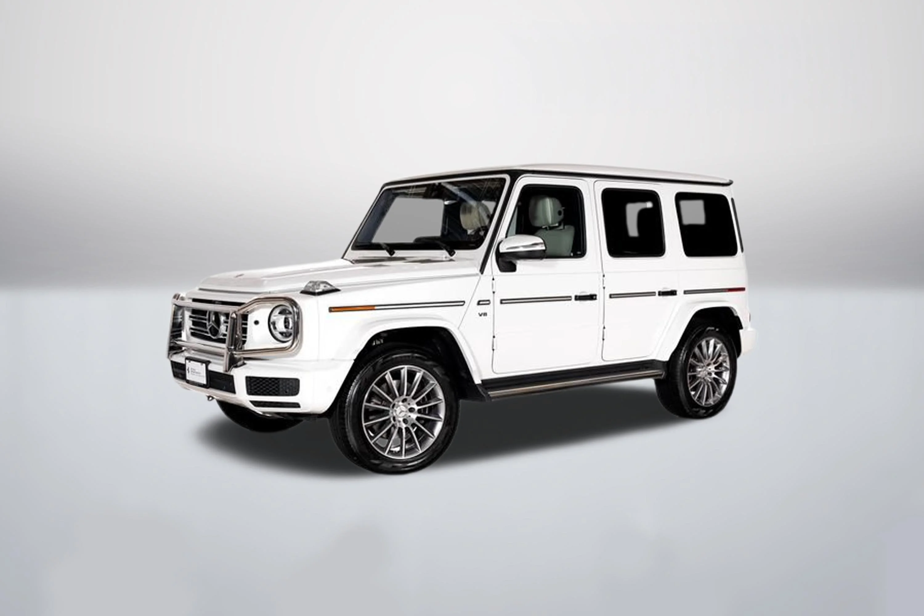 Used 2024 MANUFAKTUR Moonlight White Metallic Mercedes-Benz G 550 image 1