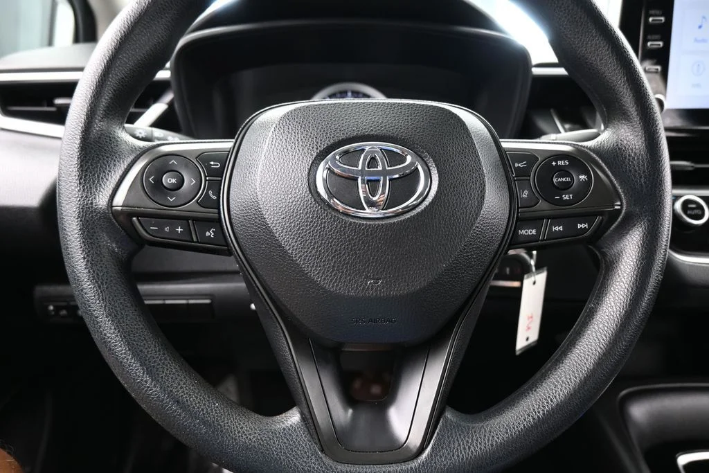 Used 2021 Super White Toyota LE image 20
