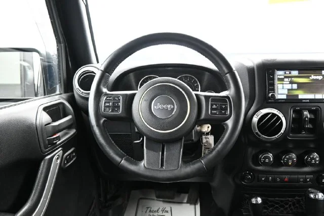 Used 2017 Black Jeep Unlimited Sahara image 21