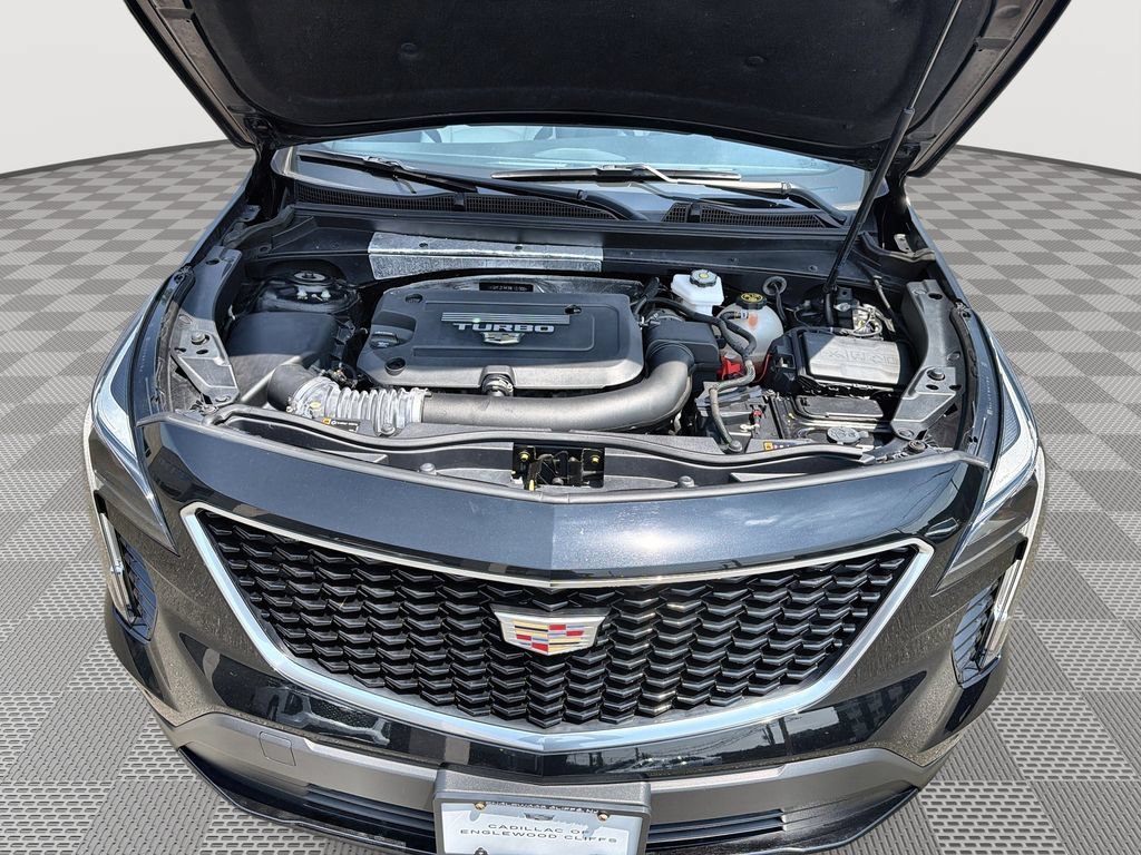 Used 2022 Stellar Black Metallic Cadillac Sport image 18